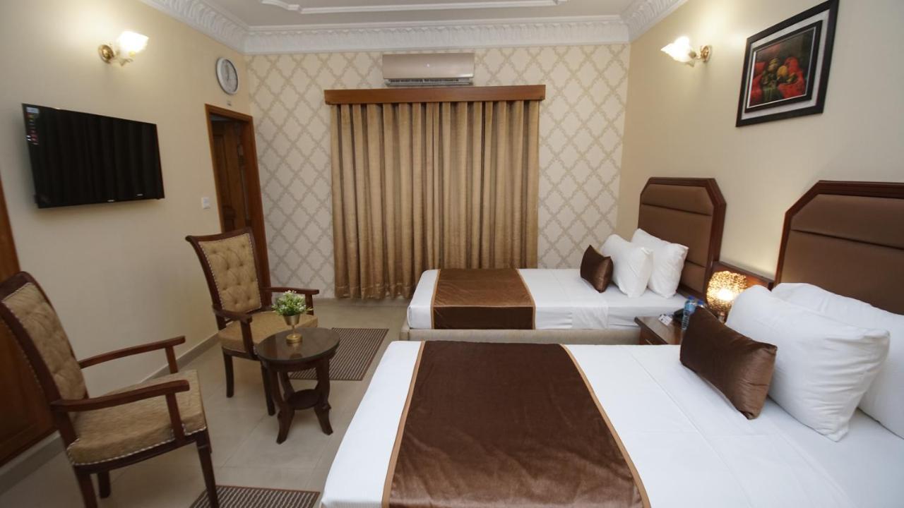 World Inn Hotel Karacsi Kültér fotó