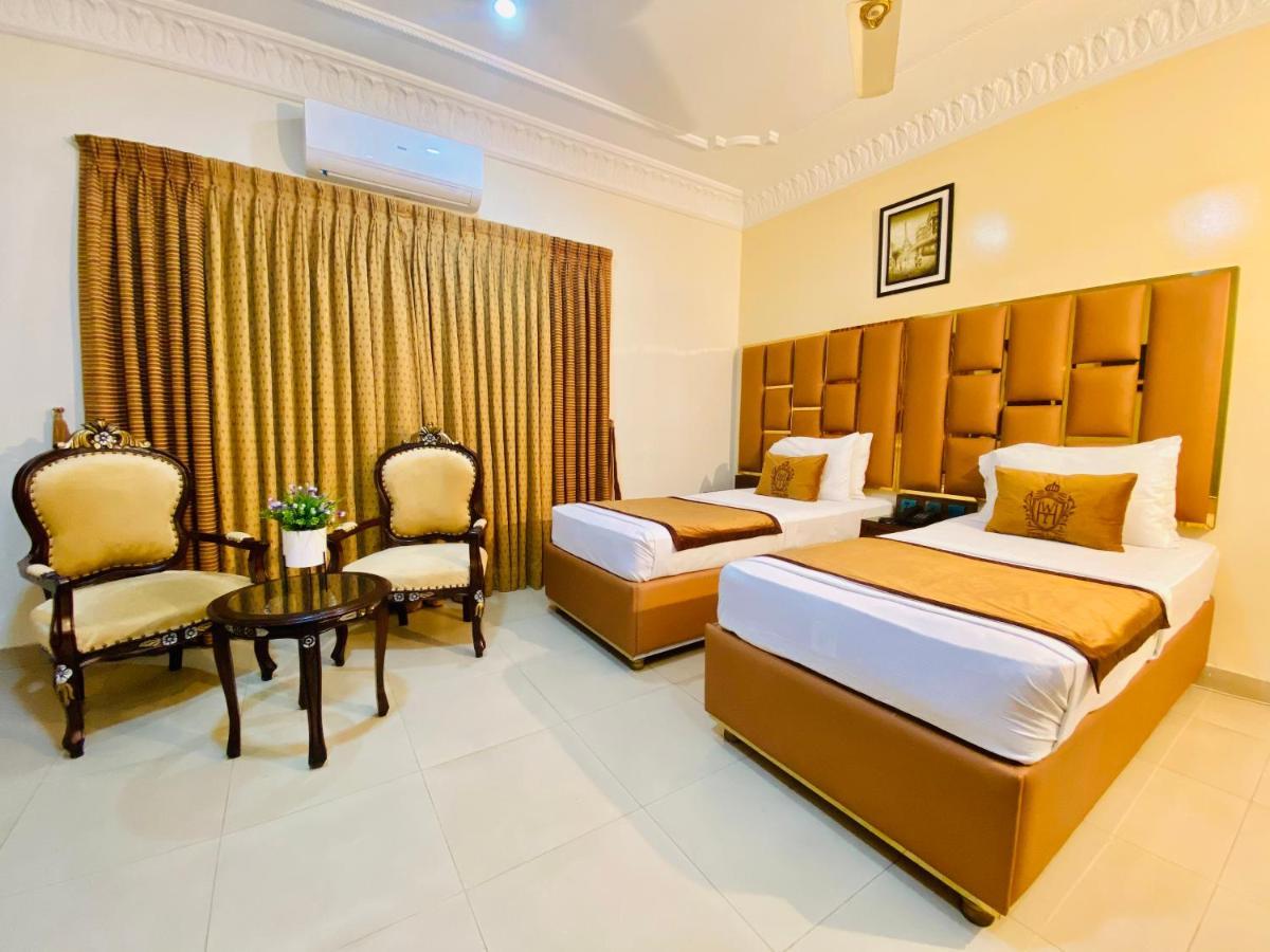 World Inn Hotel Karacsi Kültér fotó